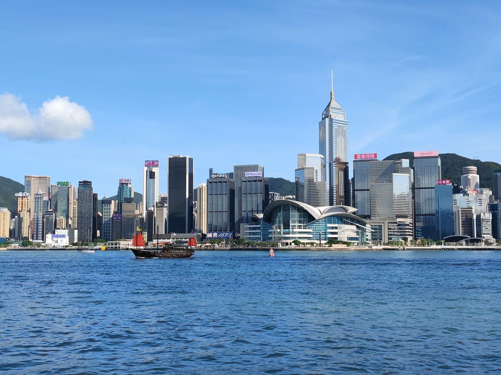 Hong Kong harbour with boats and the city skyline
