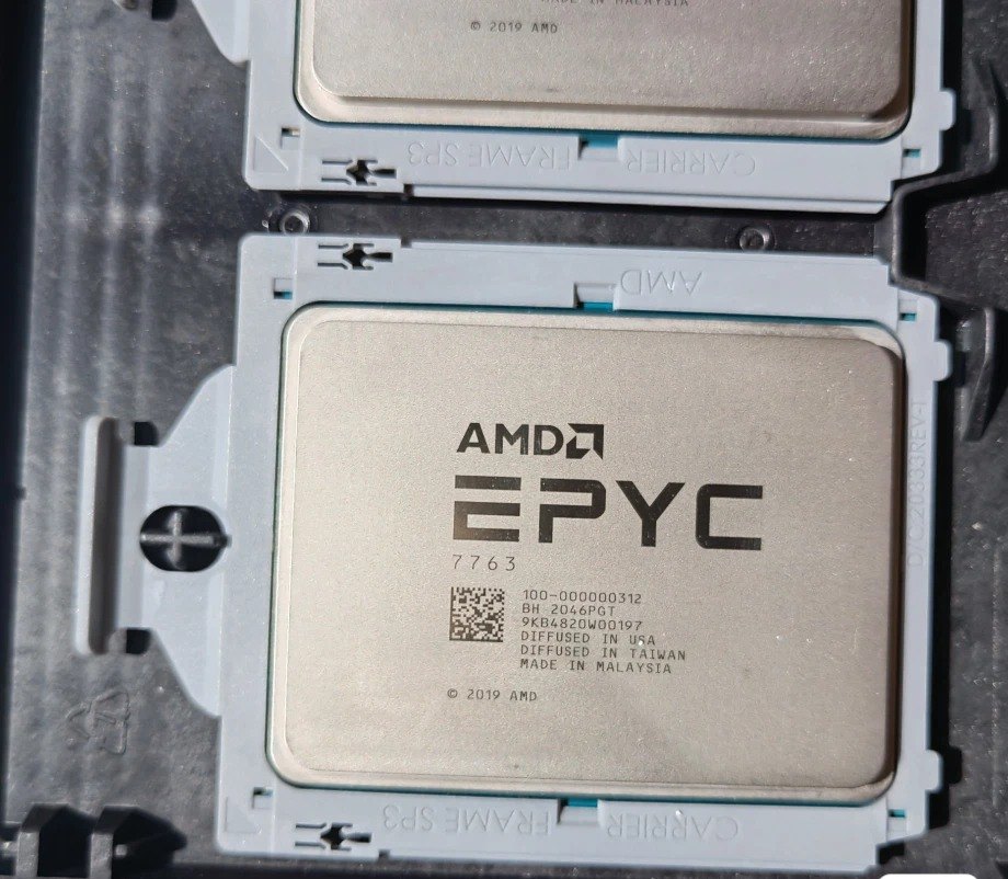 Matched pair of AMD EPYC 7763 CPUs in SP3 carrier frames, tray stock
