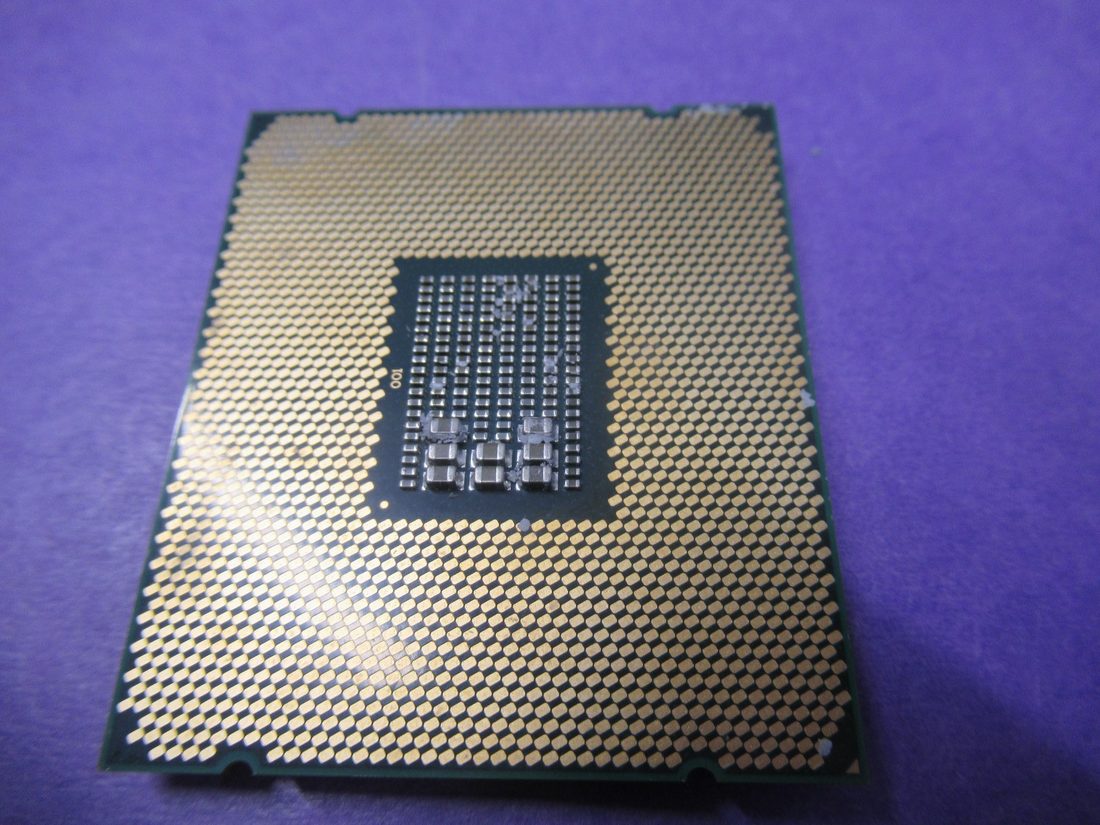 FCLGA2011 land grid array (processor underside) - representative package photo, shown for the socket type rather than as the underside of this exact unit