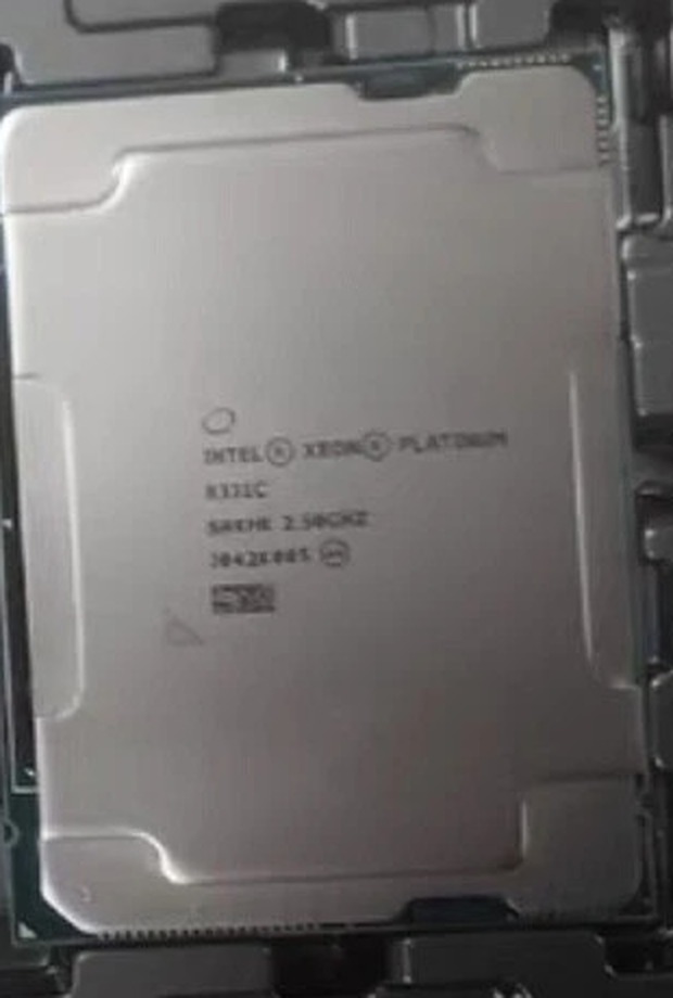 Intel Xeon Platinum 8331C processor seated in its shipping tray, heat-spreader marking visible - a single unit cropped from a tray of four